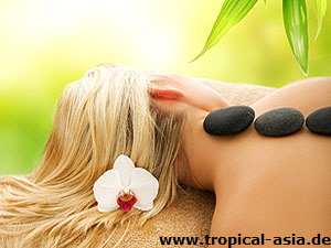 massage with hot stones © Andrejs Pidjass - Fotolia.com